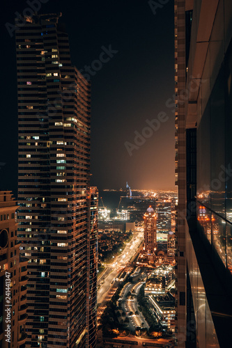 Canvas Print Dubai at night with the Burj al arab in the distance