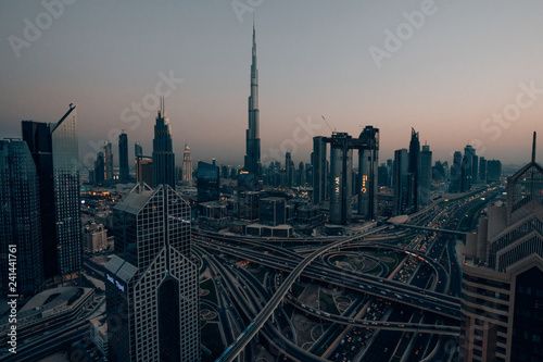 Skyline of Dubai with a huge street in front of the Burj Khalifa