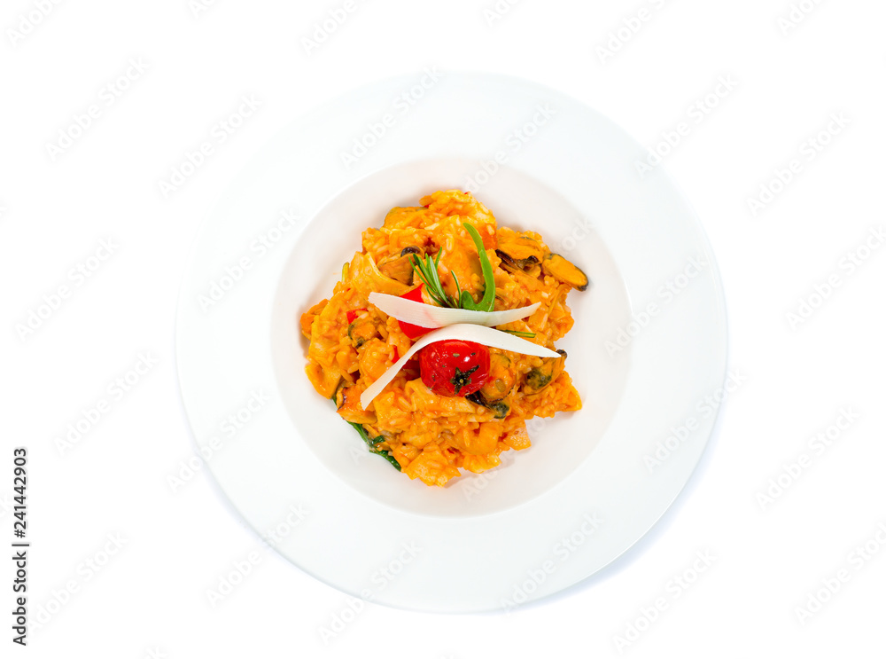 Seafood risotto with mussel shrimp and squid isolated on white Seafood risotto with mussel shrimp and squid isolated on white