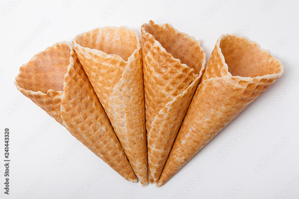 Waffle ice cream cones on a white background. Waffle ice cream cones on a white background.