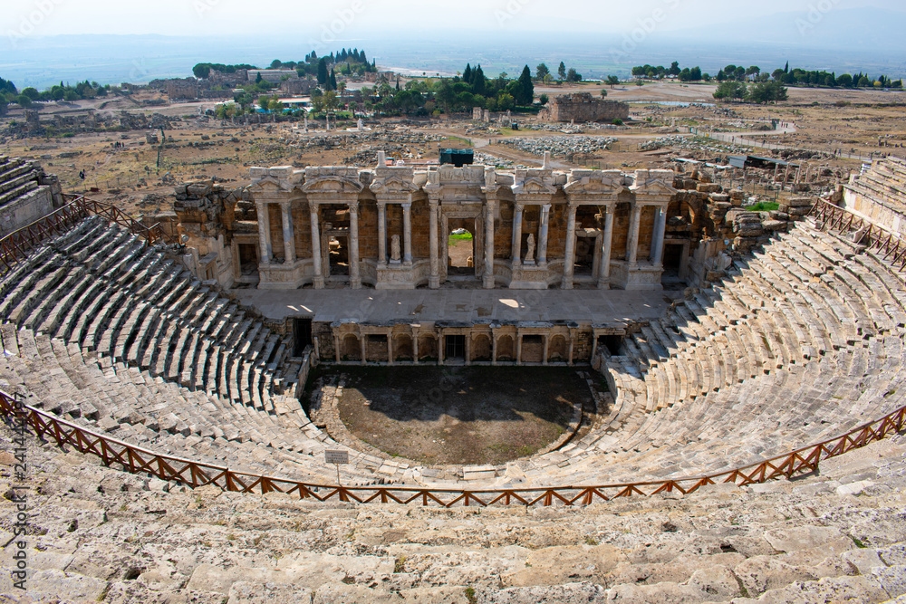Old ancient ruins of roman amphitheater in City Hierapolis in Pamukkale, Turkey 