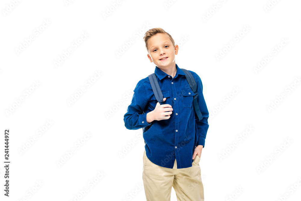 schoolboy in blue shirt with hand in pocket holding backpack straps  isolated on white Stock Photo | Adobe Stock