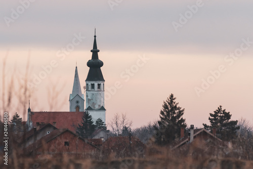 two churches in the village by the lake