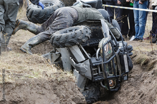 Racing on a dirt atv
