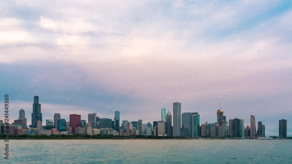 Sunset time-lapse of Downtown Chicago - Day transitions to night Sunset time-lapse of Downtown Chicago - Day transitions to night