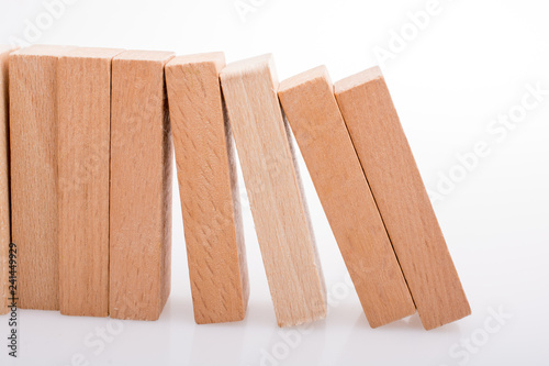 Wooden domino blocks on white background