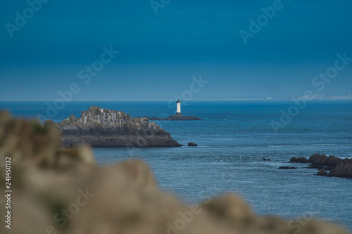 lighthouse on island in France Pointe du Grouin