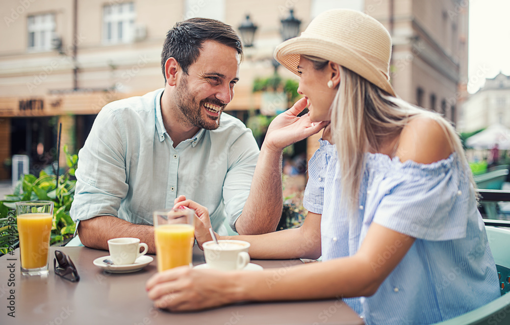 Romantic couple in the cafe. Dating, love, relationships Romantic couple in the cafe. Dating, love, relationships
