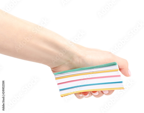 Colorful notes paper in hand on white background isolation