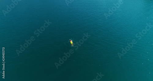swimmer in a lake in aerial view © Fly_and_Dive