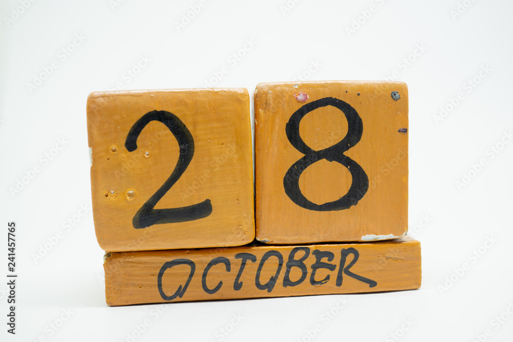 october 28th. Day 28 of month, handmade wood calendar isolated on white background. autumn month, day of the year concept october 28th. Day 28 of month, handmade wood calendar isolated on white background. autumn month, day of the year concept