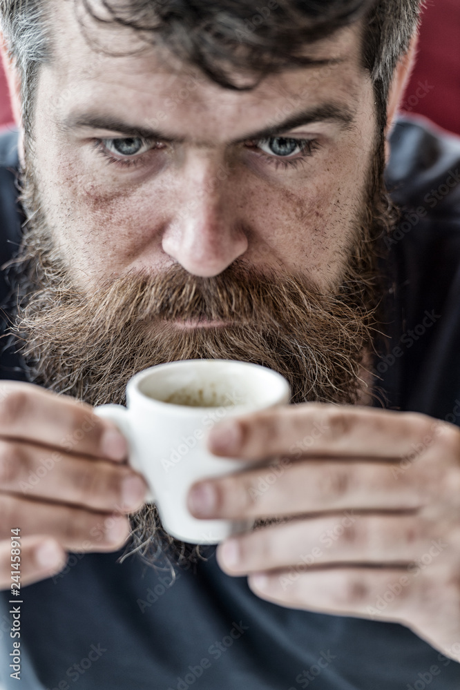 Guy relaxing with espresso coffee. Coffee break concept. Hipster drinking coffee close up. Caffeine recharge. Man with beard and mustache and cup of coffee. Bearded guy enjoy aroma fresh espresso Guy relaxing with espresso coffee. Coffee break concept. Hipster drinking coffee close up. Caffeine recharge. Man with beard and mustache and cup of coffee. Bearded guy enjoy aroma fresh espresso
