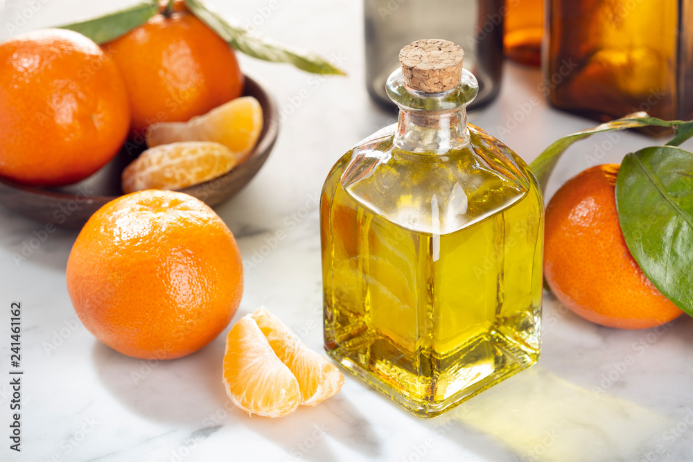 Tangerine essential oil. Mandarin Orange oil for skin care, spa, wellness, massage, aromatherapy and natural medicine. Citrus oil Tangerine essential oil. Mandarin Orange oil for skin care, spa, wellness, massage, aromatherapy and natural medicine. Citrus oil