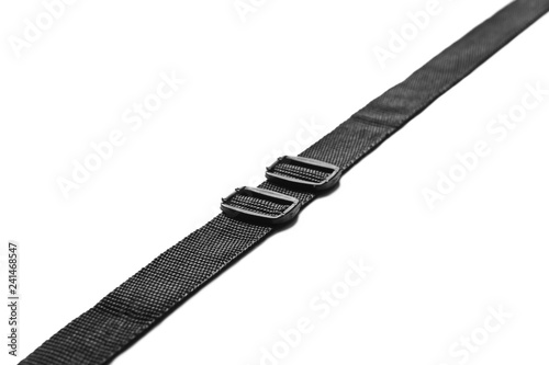 Black nylon fastening belt, strap isolated on white background