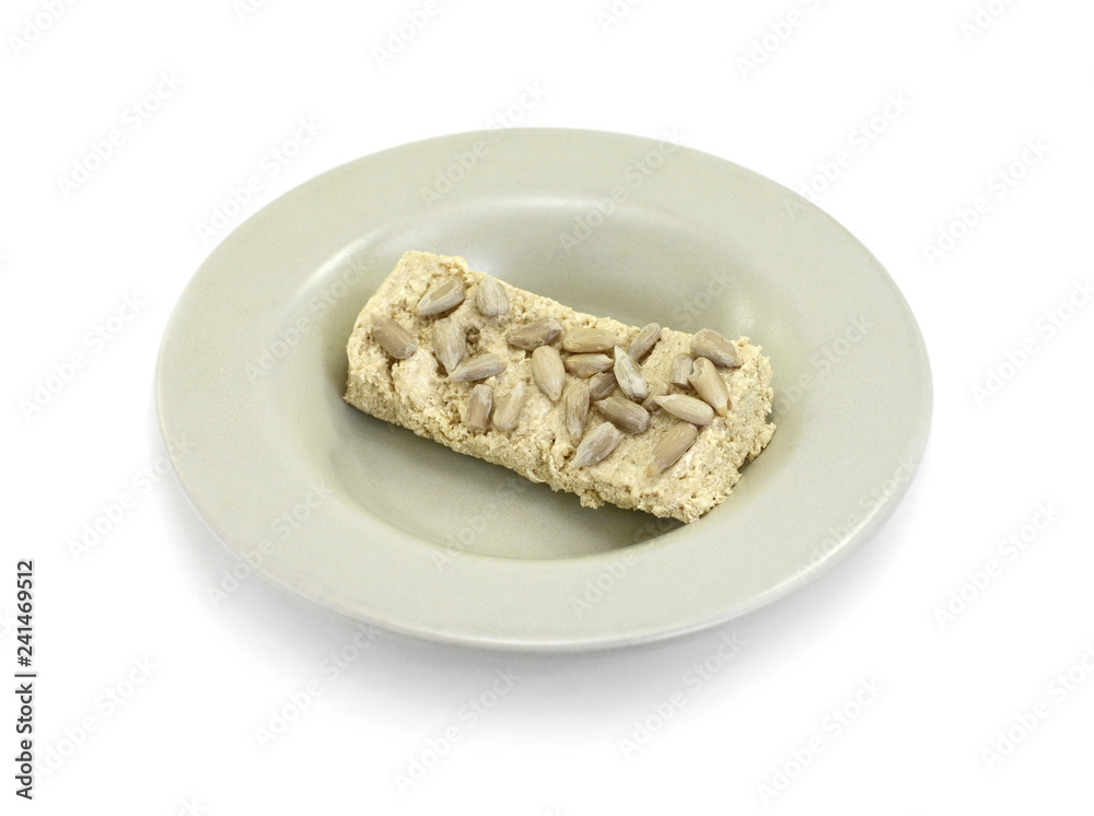 Sunflower halva isolated on white background. Sunflower halva isolated on white background.