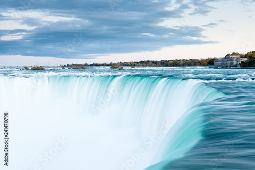 The view across the Horseshoe Falls at dusk, a part of the Niagara Falls, viewed from the Canadian side. The falls straddle the border between America and Canada.