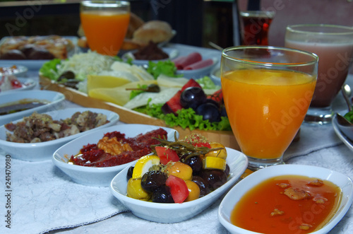 Traditional Turkish Breakfast with marmelade, olive,orange juice, grape juice and fruits