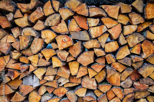 Pile of chopped fire wood prepared for winter