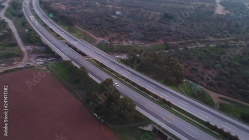 Aerial footage of a car on a highyway Via drone with 4k resolution photo