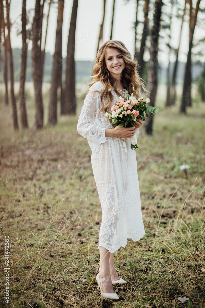 A beautiful bride portrait in the forest.