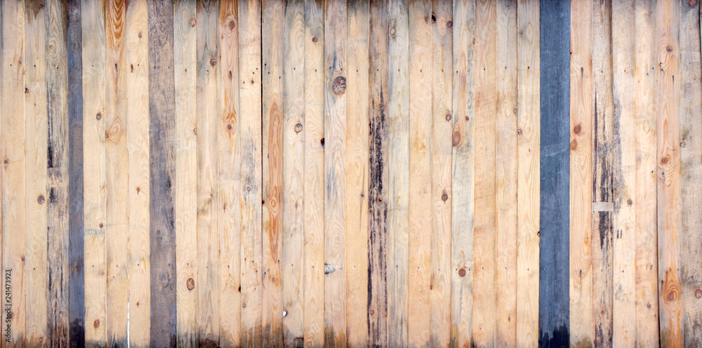 Brown wood colored plank wall texture background Brown wood colored plank wall texture background