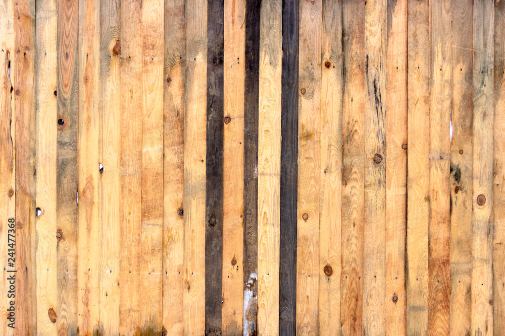 Multicolored wooden surface with old faded paint texture