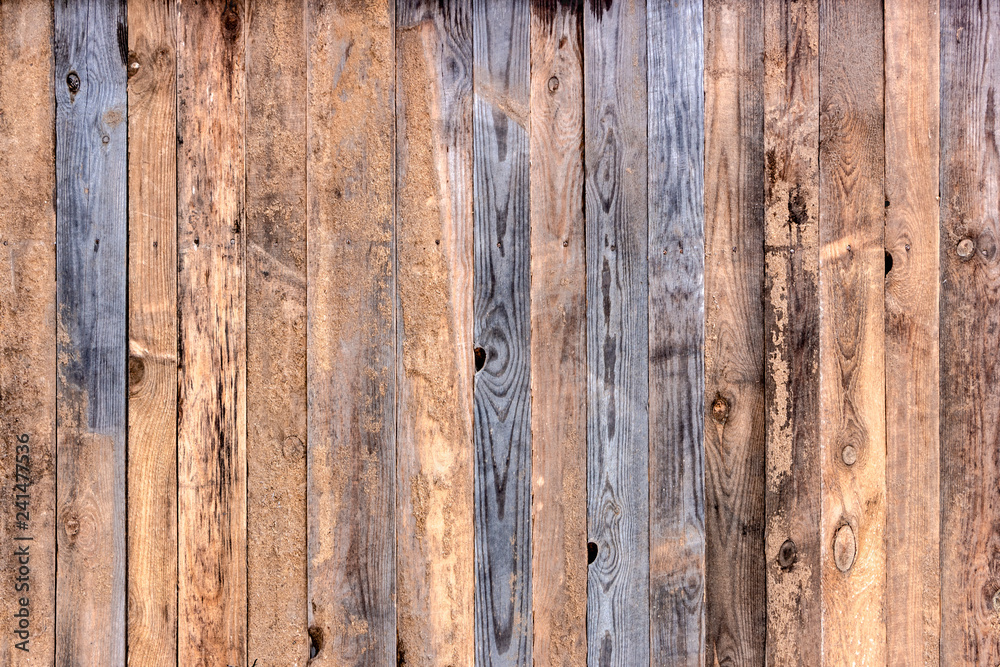 Multicolored wooden surface with old faded paint texture