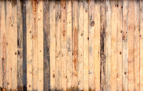 Multicolored wooden surface with old faded paint texture