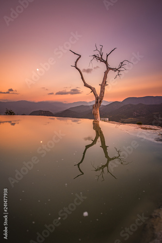Canvas Print Amazing sunset over the incredible petrified waterfalls of Hierve el Agua in Oax