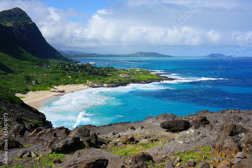 Landscape view of the shoreline and Pacific Ocean at Makapuʻu Point on the Eastern coast of Oʻahu, Hawaii photo