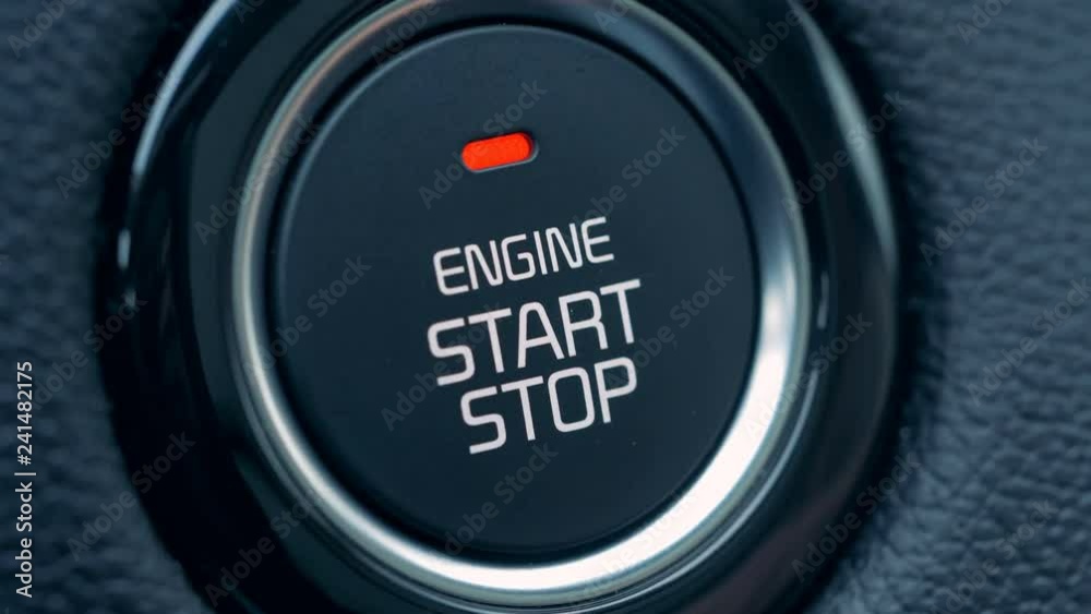 Man starts and stops a car engine, close up. Man starts and stops a car engine, close up.