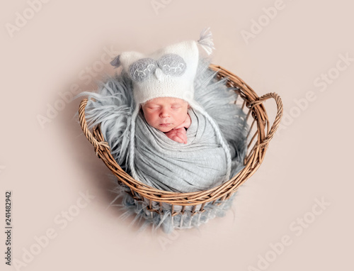 Baby sleeping in basket