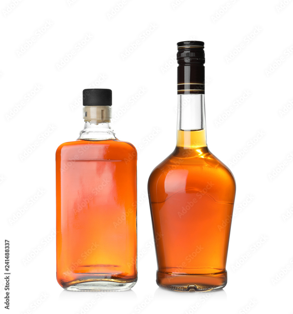Bottles of scotch whiskey on white background Bottles of scotch whiskey on white background