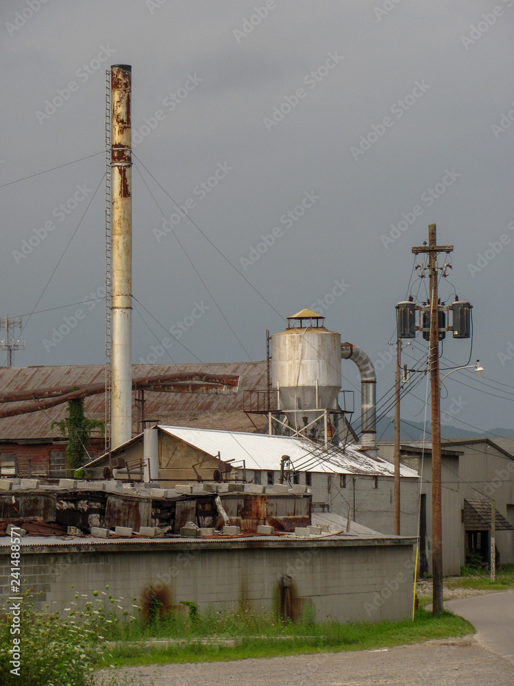 Obraz premium factory with industrial chimney