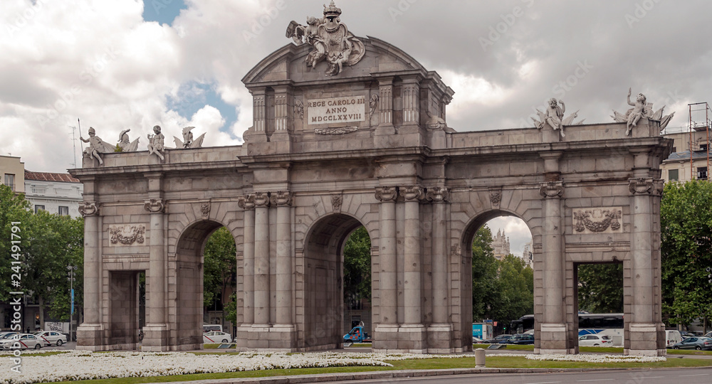 MADRID SPAIN - MAY 2014. Puerta de Alcala with cars circulating in Madrid, the capital of Spain.