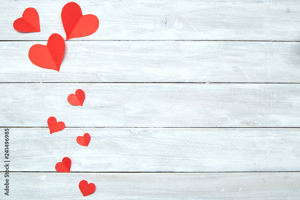 Red paper hearts on white wood Valentine's Day Red paper hearts on white wood Valentine's Day