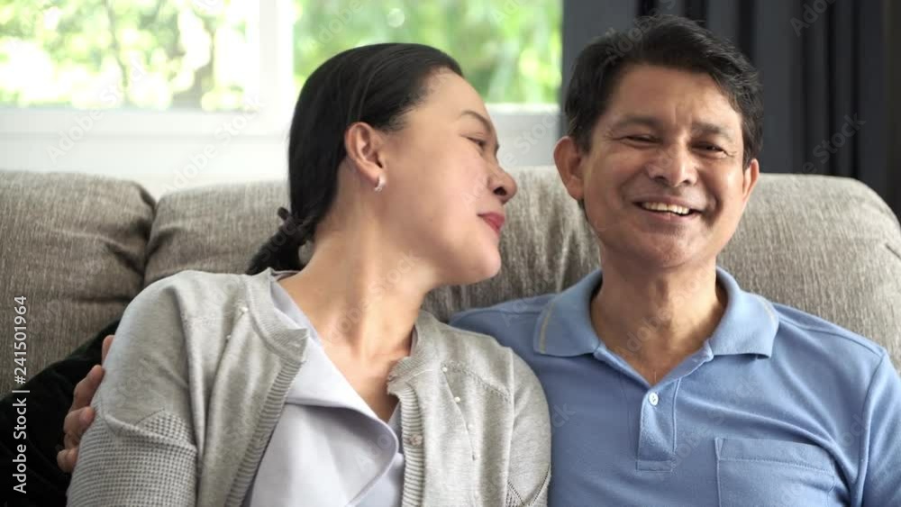 Asian senior couple portrait, happy smile laughing at camera, close up shot. Asian senior couple portrait, happy smile laughing at camera, close up shot.