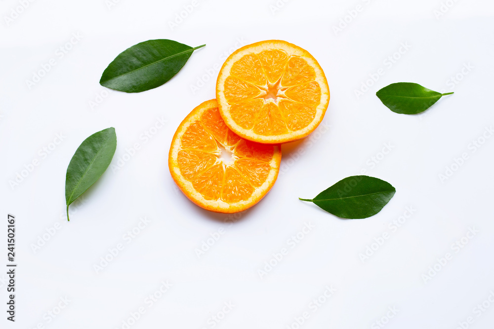Fototapeta premium Fresh orange citrus fruits with leaves on white background.