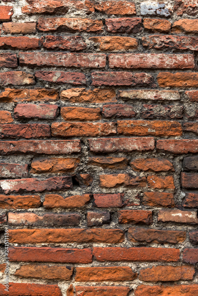 Old orange brick wall, close up. Old orange brick wall, close up.