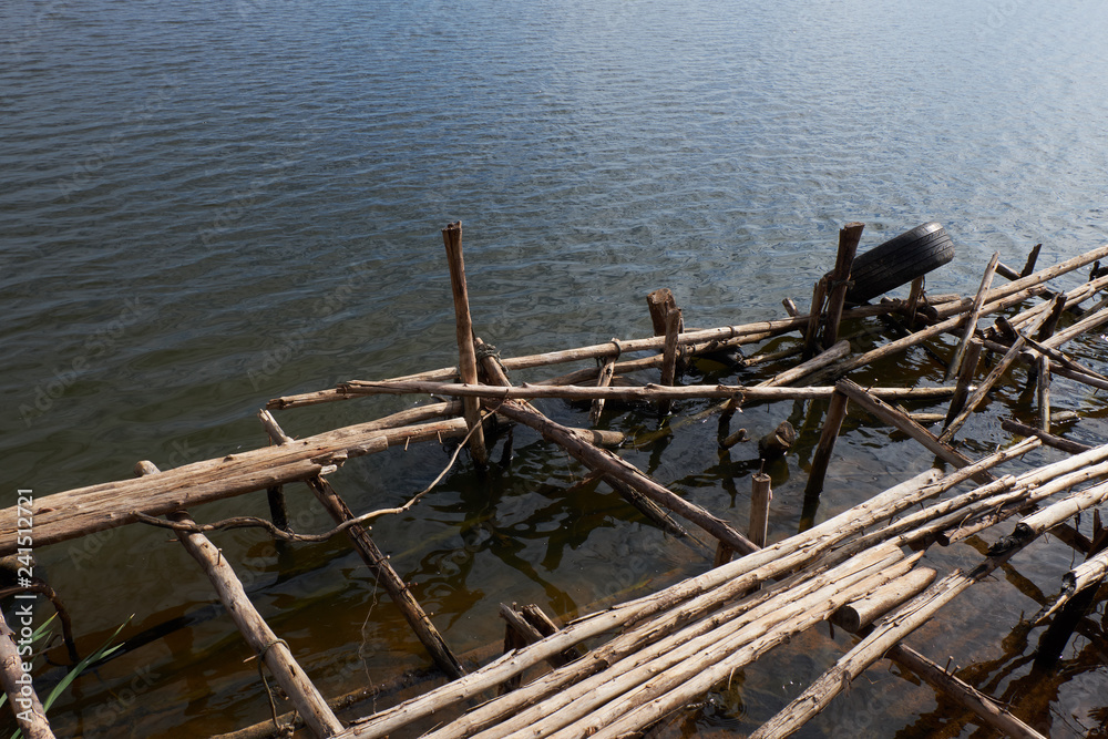 The pier is broken at the water's edge The pier is broken at the water's edge