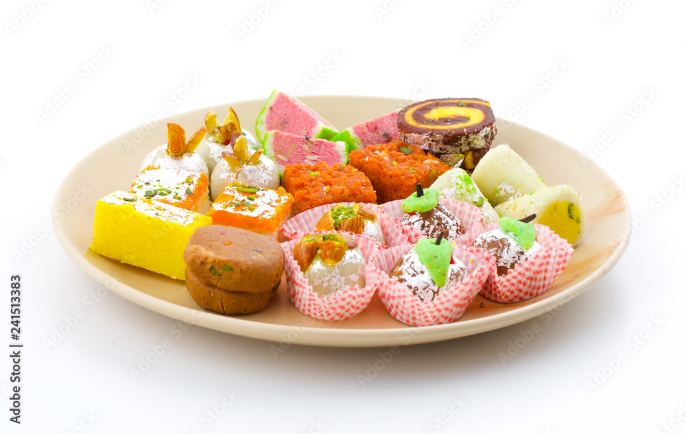 Indian Traditional Mix Sweet Food or Mix Mithai include Peda, Mawa Burfi, Dry Fruits Sweet, Halwa or Coconut Burfi Indian Traditional Mix Sweet Food or Mix Mithai include Peda, Mawa Burfi, Dry Fruits Sweet, Halwa or Coconut Burfi
