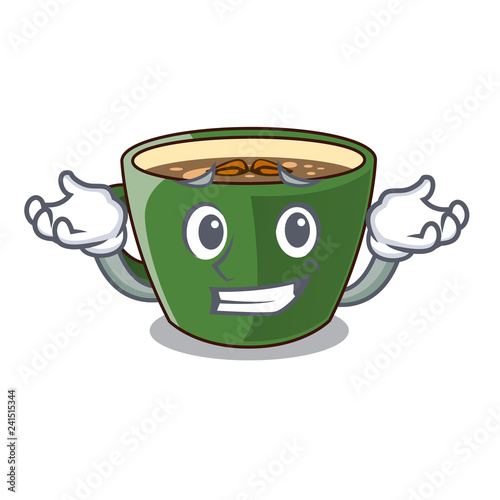 Grinning Indian masala tea on character board