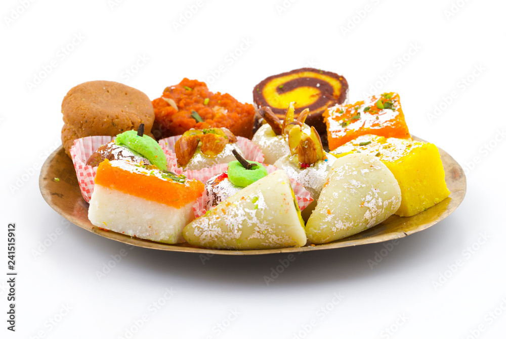 Indian Traditional Mix Sweet Food or Mix Mithai include Peda, Mawa Burfi, Dry Fruits Sweet, Halwa or Coconut Burfi Indian Traditional Mix Sweet Food or Mix Mithai include Peda, Mawa Burfi, Dry Fruits Sweet, Halwa or Coconut Burfi