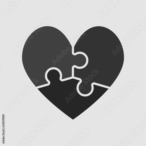 Red piece puzzle of romantic heart. Three pieces.