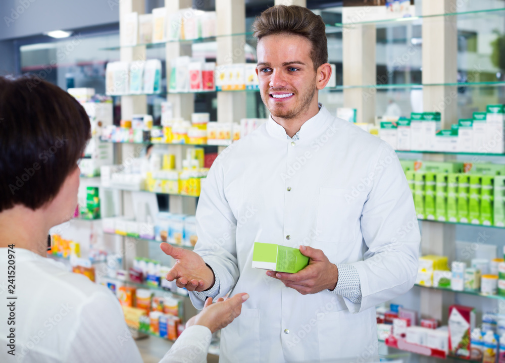 pharmacist  helping customers