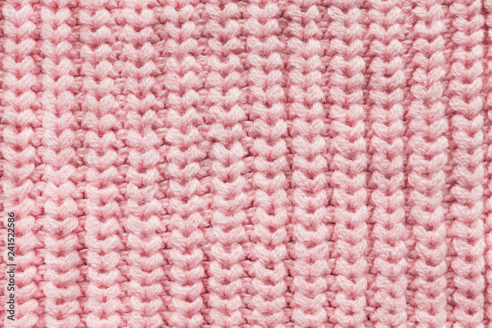 Pink knitted texture Pink knitted texture
