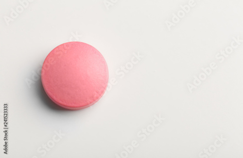 Colorful pill on white background