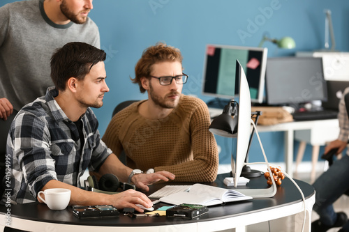 IT specialists working in o...
