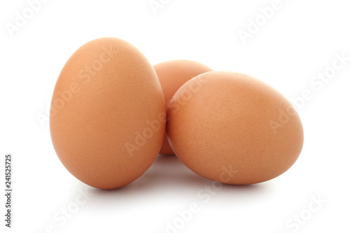 Raw chicken eggs on white background