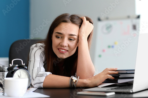 Stressed businesswoman miss...